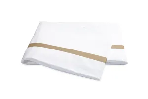 Lowell Champagne on White Bedding by Matouk