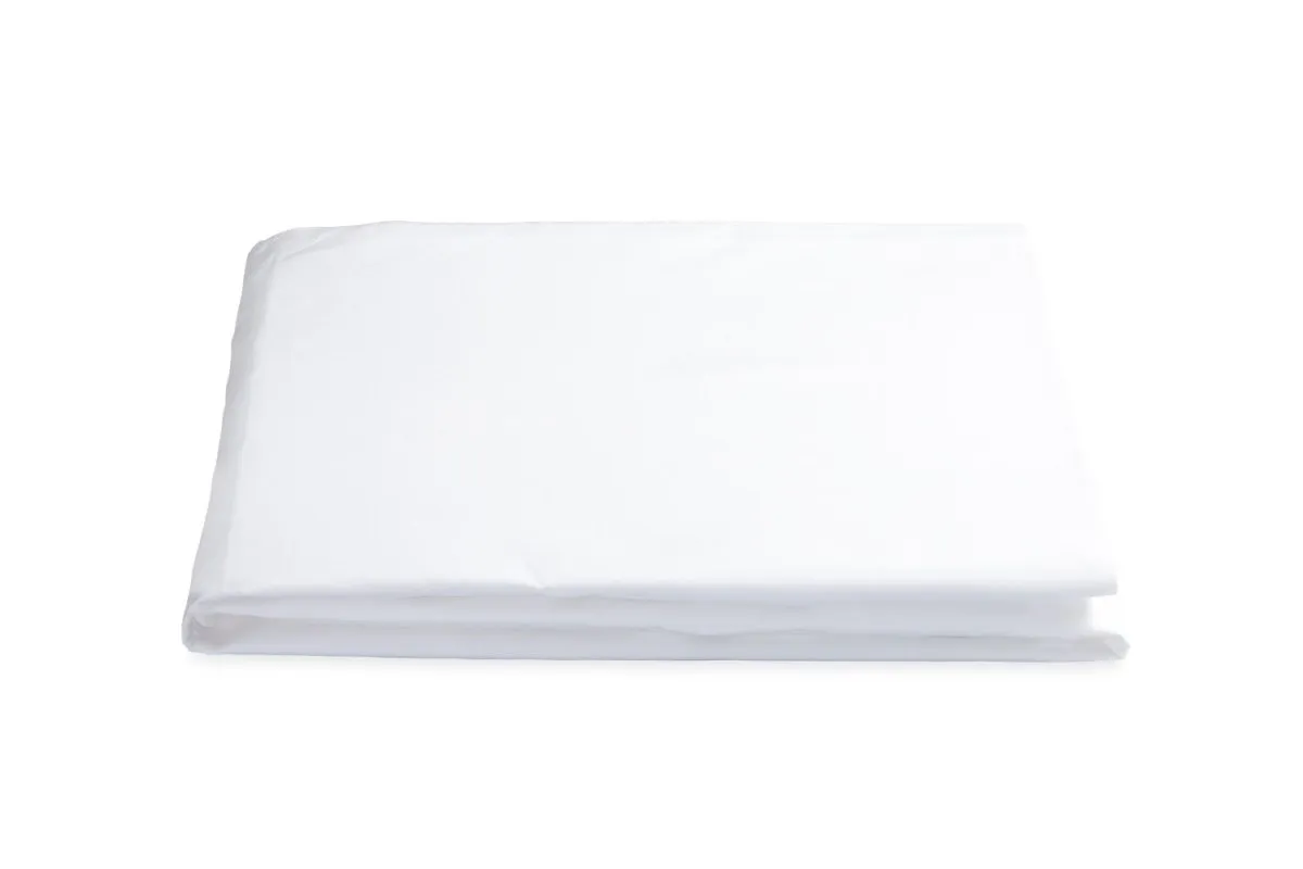 Lowell Champagne on White Bedding by Matouk